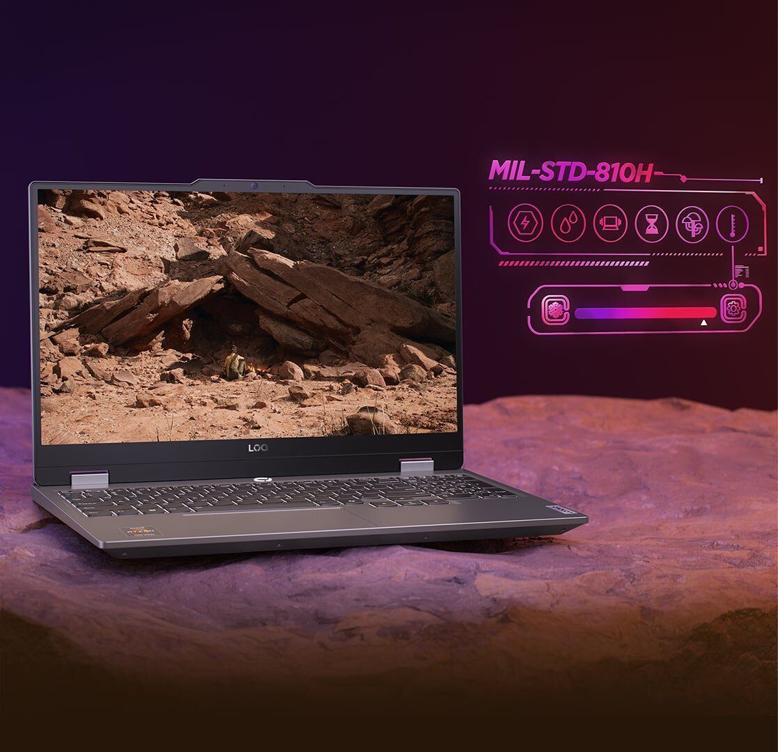 Otwarty laptop LOQ 15ARP9 stojący na kamiennej płycie, na ekranie tapeta pokazująca skały